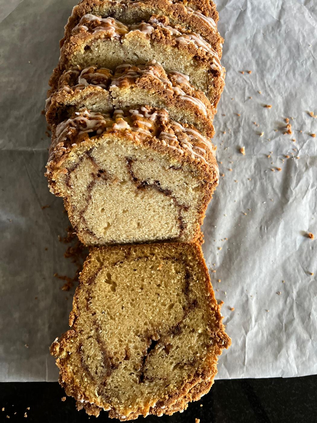 A sliced CHIPPY'S cinnamon streusel loaf cake